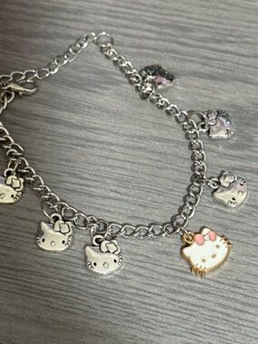 Hello Kitty Silver-Tone Charm Bracelet with Pink Bow Accent
